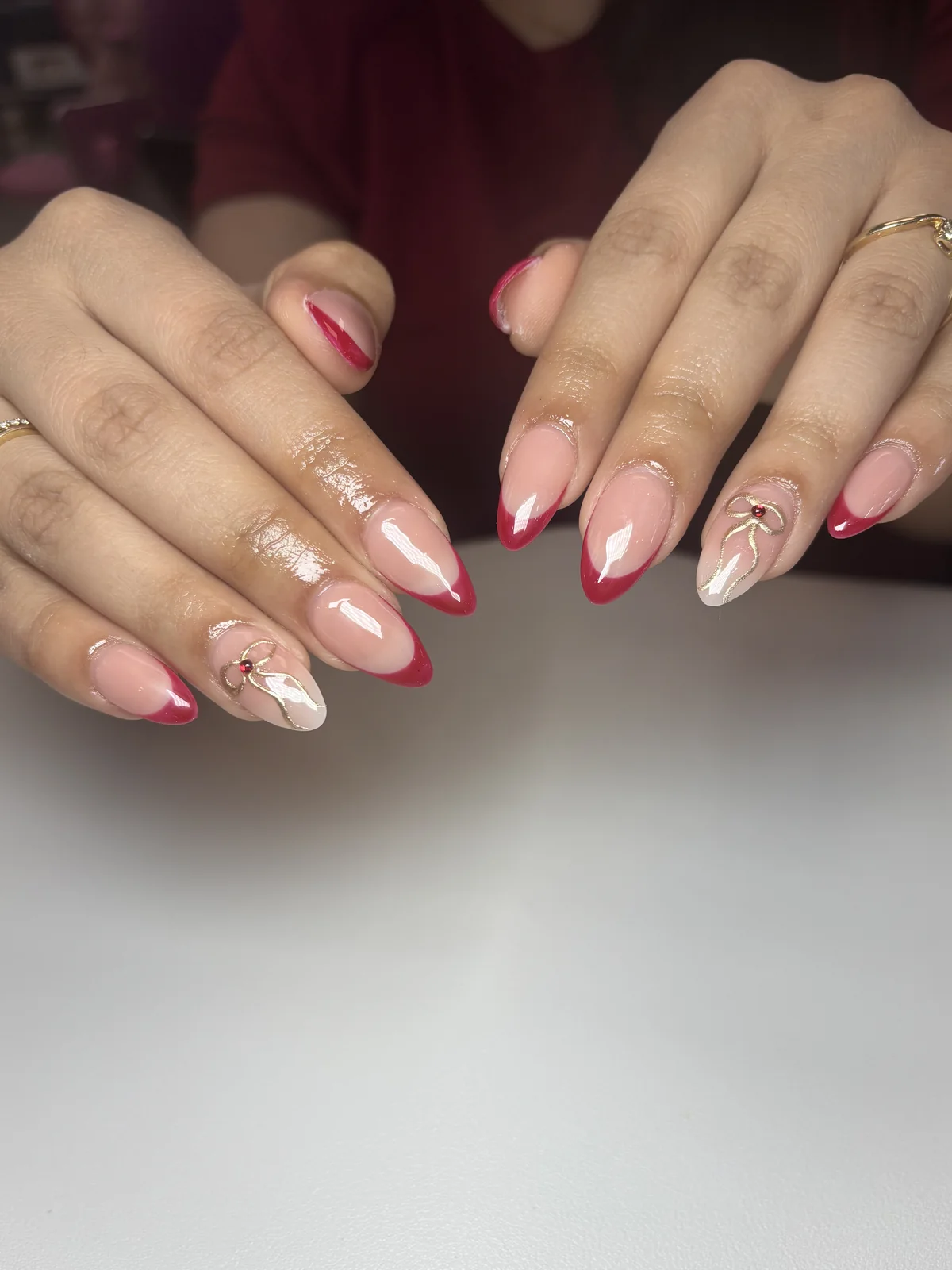 Blush pink manicure with glitter accents by Top Ten Nails Spa