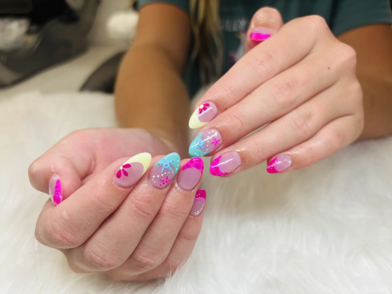 Bright pink and pastel floral nail art by Top Ten Nails Spa