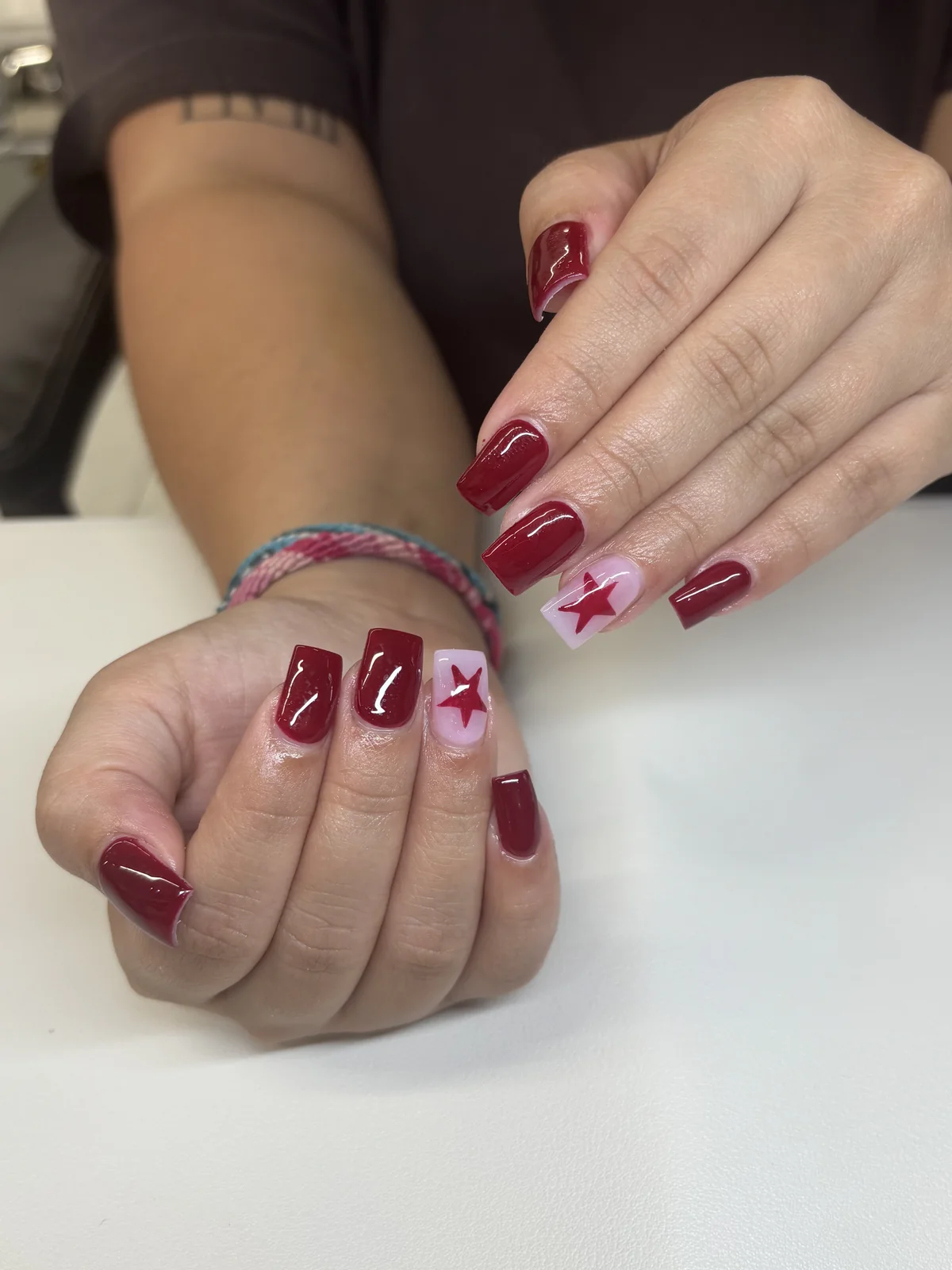 Scarlet starlight holiday manicure by Top Ten Nails Spa
